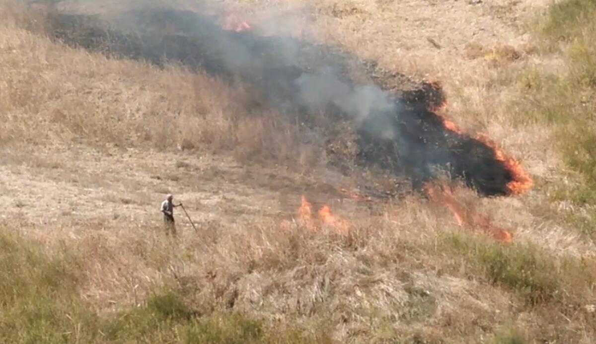 Colto sul fatto e filmato incendiario - 